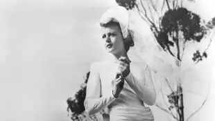 Angela Lansbury in her stunning wedding gown 1949 marriage husband Peter Shaw pictures photos age