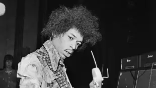 American guitarist, composer and singer Jimi Hendrix doing the soundcheck before performing at Saville Theatre in London, United Kingdom 1967.