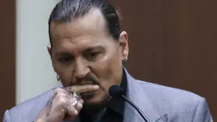 Johnny Depp shocking texts Amber Heard trial lawsuit defamation 2022 corpse Paul Bettany Vanessa Paradis Elton John