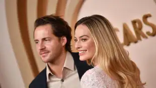 Margot Robbie and Tom Ackerley