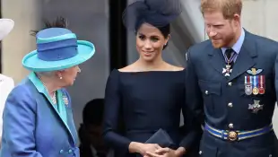 La reina Isabel II, Meghan Markle y el príncipe Harry