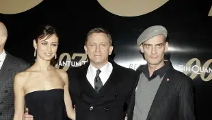 Olga Kurylenko, Daniel Craig and Anatole Taubman