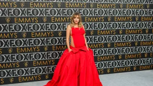 Suki Waterhouse shows off baby bump in Valentino dress