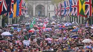 Crowds on the way to Buckingham Palace after the coronation of Charles 2023