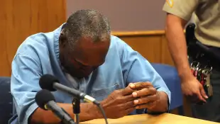 O J Simpson reacts after learning he was granted parole at Lovelock Correctional Center in Lovelock