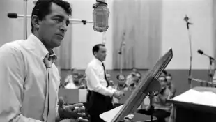 Dean  Martin  recording  in  studio  with  a  live  band,  California,  United  States,  November  1