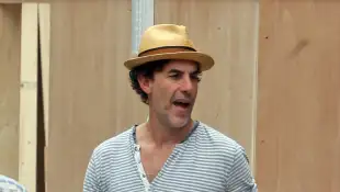 Sacha Baron Cohen Sacha Baron Cohen seen in north london with his daughter enjoying a street performer No UK, Credit:Ava