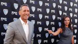 Actors and husband and wife Angelo Pagan (L) and Leah Remini attend FOX Sports/PAC-10 Conference Hollywood premiere nigh