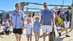 Elton John and his husband David Furnish with their children