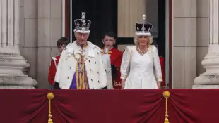 King Charles and Queen Camilla on the balcony of Buckingham Palace after their coronation in 2023