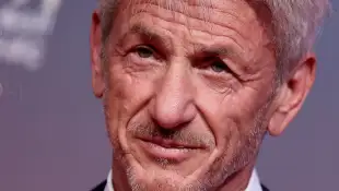 Sean Penn officialise avec sa compagne Valeria Nicov au photocall de la cérémonie d'hommage à Sean Penn lors de la deuxième journée du 21ème Festival international du film de Marrakech