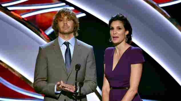 Eric Christian Olsen and Daniela Ruah speak onstage at The 41st Annual People's Choice Awards