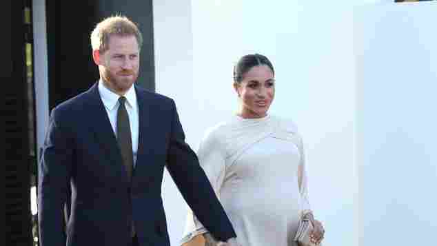 Prince Harry and Duchess Meghan arrive at a reception hosted by the British Ambassador to Morocco at the British Residence