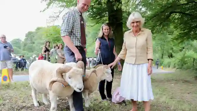 Duchess Camilla posing with some animals on her 72nd birthday