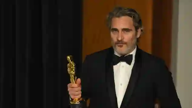 Joaquin Phoenix quoted his late brother River in a tearful Oscar speech.