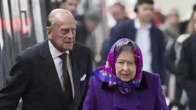 Queen Elizabeth II and Prince Philip arrive at King's Lynn station.