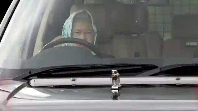 Queen Elizabeth II behind the wheel of her Range Rover at Windsor Horse Show