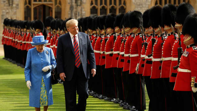 Donald Trump welcomed by guard of honour at Windsor Castle