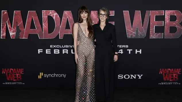 Dakota Johnson and S. J. Clarkson