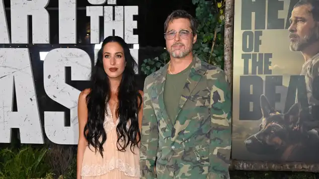 Ines de Ramon and Brad Pitt