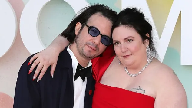 Luis Felber and Lena Dunham 