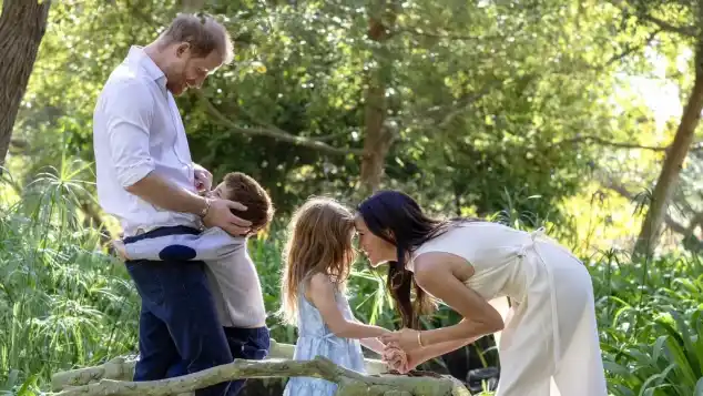 Prince Harry and Meghan Markle with their children