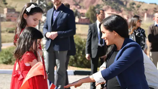 Prince Harry and Duchess Meghan meet Rania and Rayhana Minijam in Asni, Morocco
