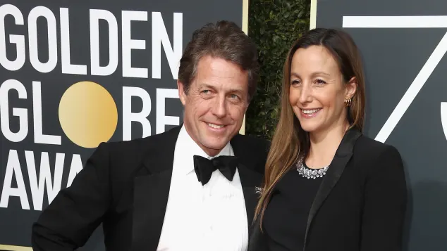 Hugh Grant and Anna Eberstein