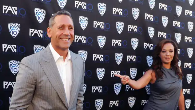 Angelo Pagan and Leah Remini