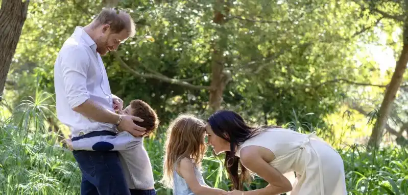 Prince Harry and Meghan Markle with their children