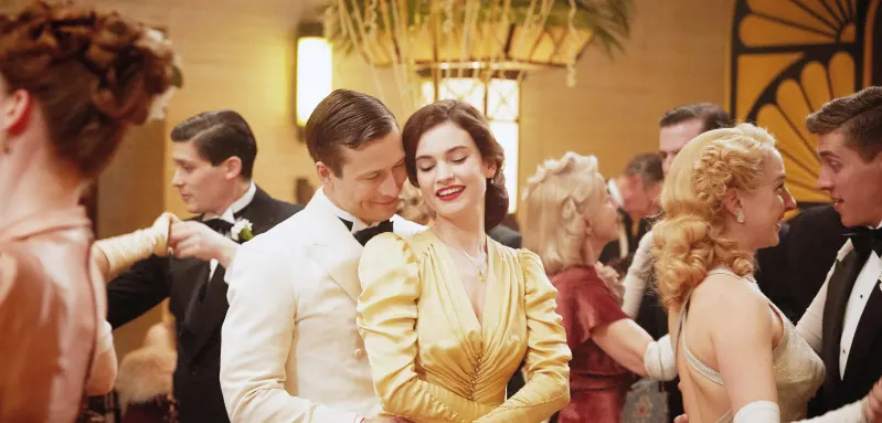 Glen Powell and Lily James in 'The Guernsey Literary and Potato Peel Pie Society'