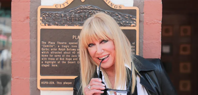 Syndication: The Enquirer Suzanne Somers poses for a photo outside of the Plaza Theatre on March 6, 2019 in Palm Springs