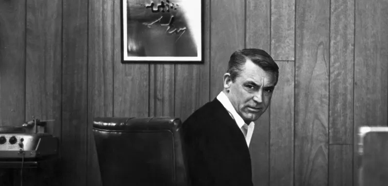 Actor Cary Grant at his house office Beverly Hills USA PUBLICATIONxINxGERxAUTxONLY Copyright: xLeoxFuchsx R0234-Grant-Ho