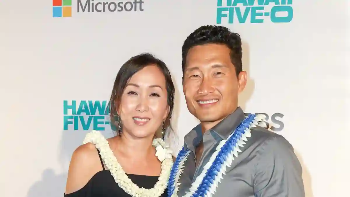 Actor Daniel Dae Kim and his wife Mia arrive at the CBS 'Hawaii Five-0' Sunset On The Beach Season 7 Premier Event at Queen's Surf Beach on September 23, 2016 in Waikiki, Hawaii