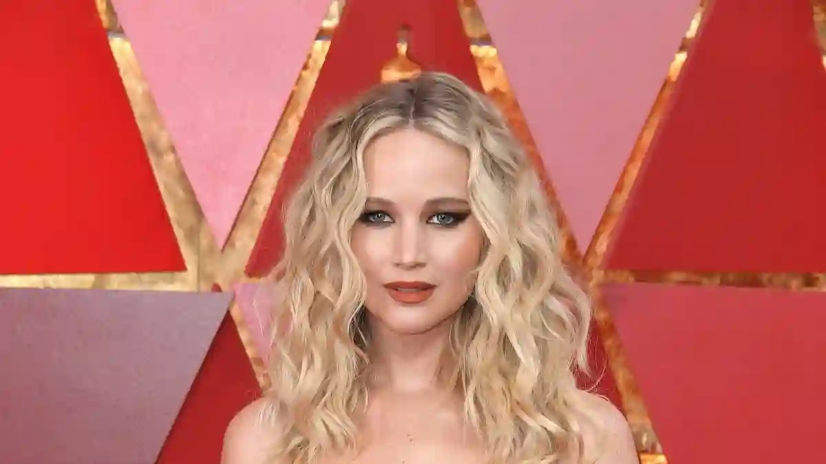 Jennifer Lawrence Reflects On Falling At The Oscars, Shares It Was "Devastating" Anderson Cooper Said She Faked It
