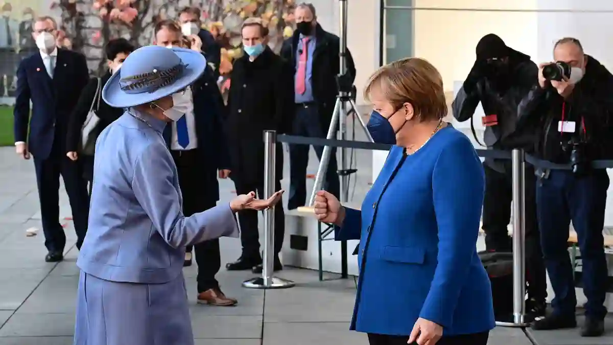 Angela Merkel's Awkward Fist Bump With Denmark's Queen Margrethe handshake fail video watch Danish royal family news latest 2021