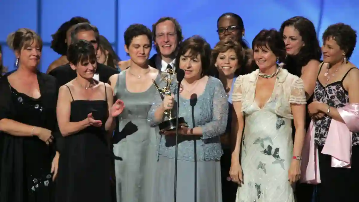 The cast of 'As The World Turns' receiving a Daytime Emmy.