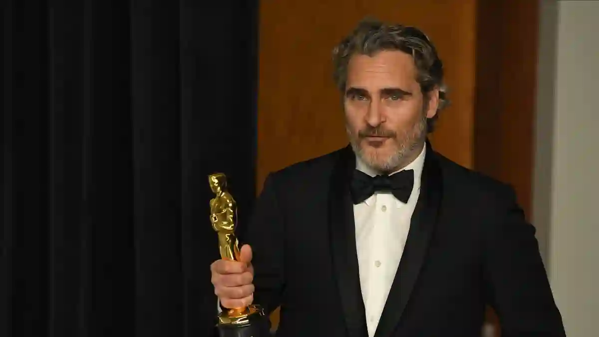 Joaquin Phoenix quoted his late brother River in a tearful Oscar speech.