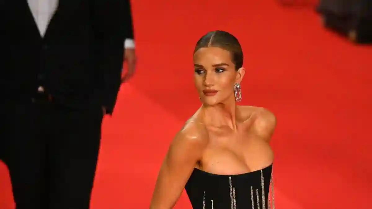 Rosie Huntington-Whiteley shows off her plump cleavage in Cannes