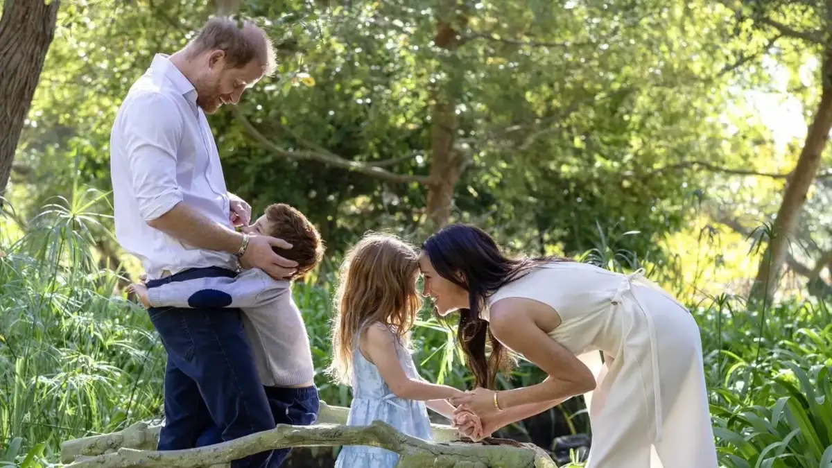 Prince Harry and Meghan Markle with their children