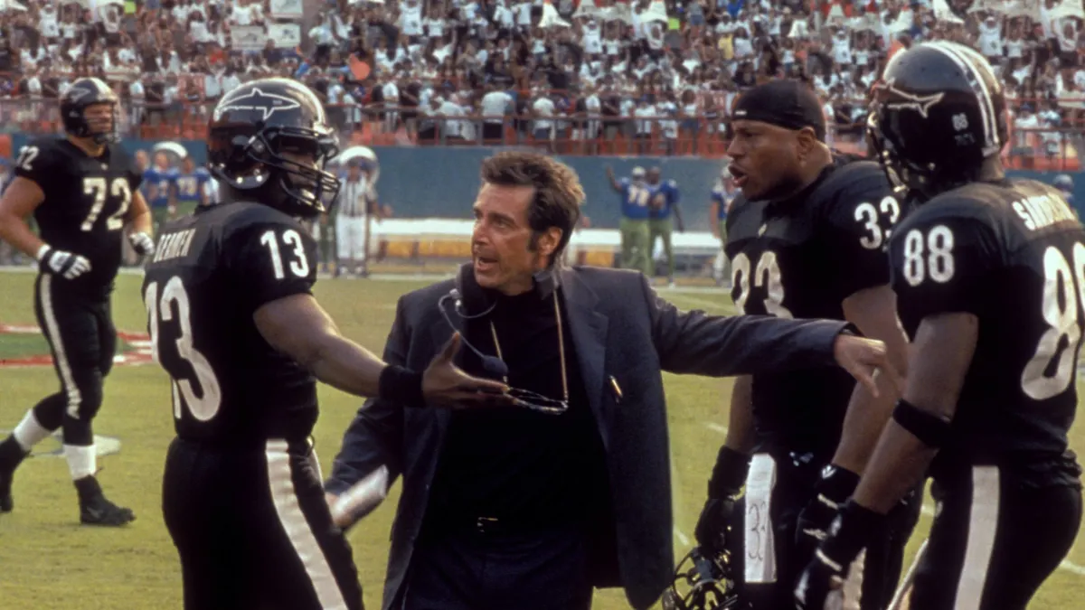 Film Still from Any Given Sunday Jamie Fox Al Pacino LL Cool J © 1999 Warner Photo Credit Robert