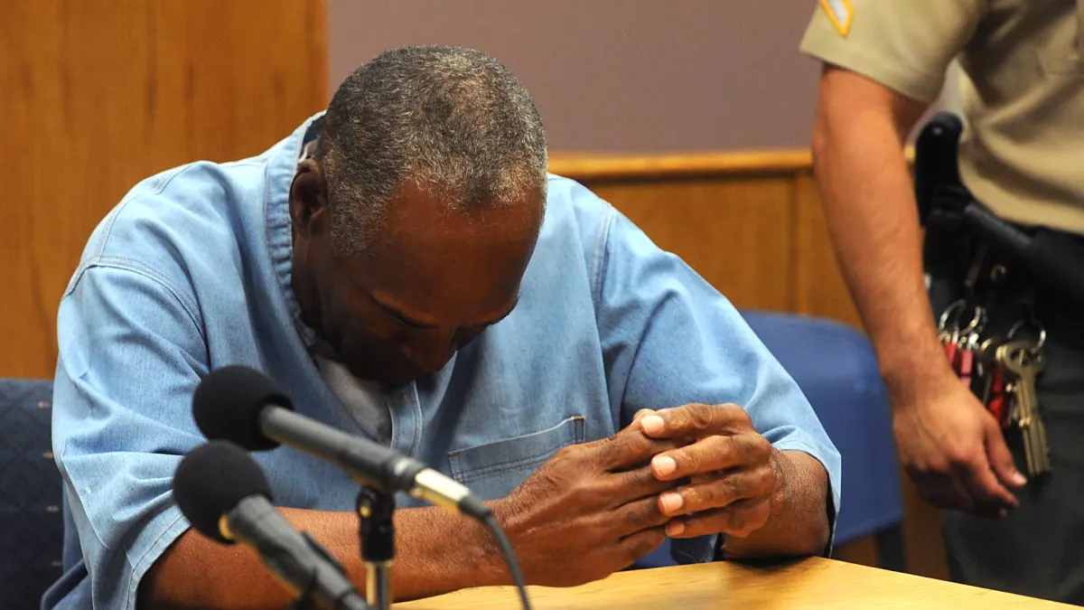 O J Simpson reacts after learning he was granted parole at Lovelock Correctional Center in Lovelock