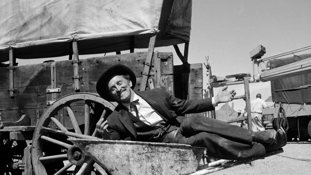 Actor  Kirk  Douglas  clowning  on  the  set  of  the  western  action  film  Gunfight  at  O.K.  Co