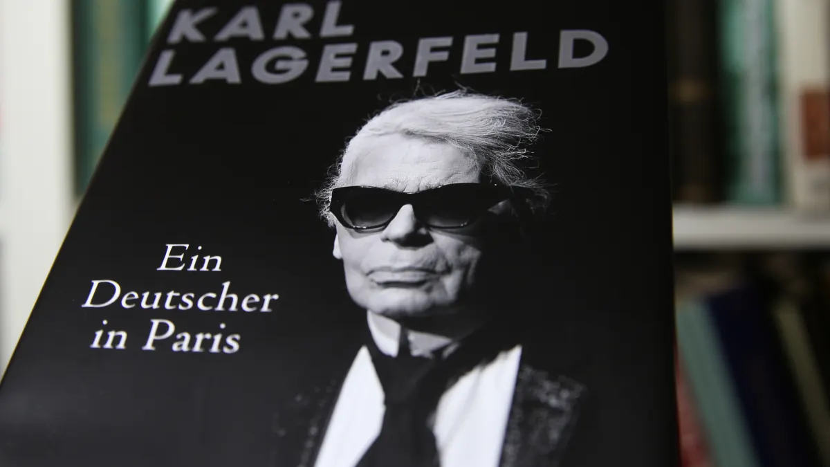 Viersen, Germany - January 2021: Close up of isolated book cover Karl Lagerfeld a german in Paris, shelf background