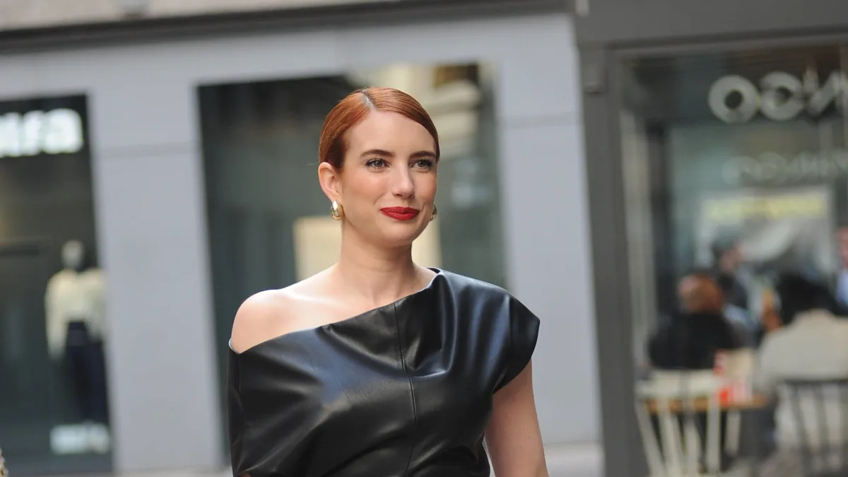 Emma Roberts in a leather dress