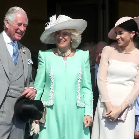 King Charles III, Queen Camilla and Meghan Markle