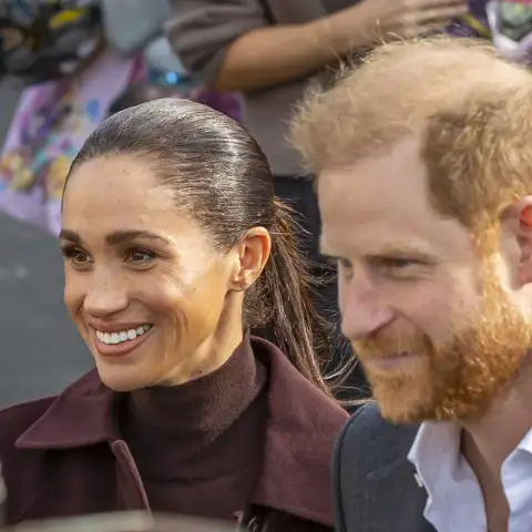 Meghan and Harry Are Cheered During Their Appearance