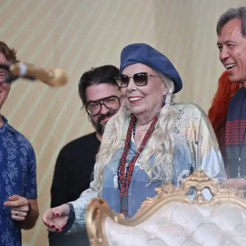 Syndication: Newport Daily News, Joni Mitchell made a surprise appearance at the Newport Folk Festival at Fort Adams Sta