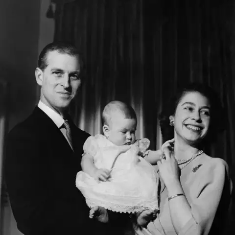 Prince Philip, Prince Charles, Queen Elizabeth II.