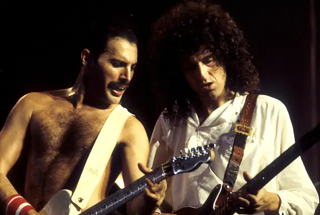 Freddie Mercury and Brian May of Queen live at a Works Tour concert at Wembley Arena. London, 09/07/1984